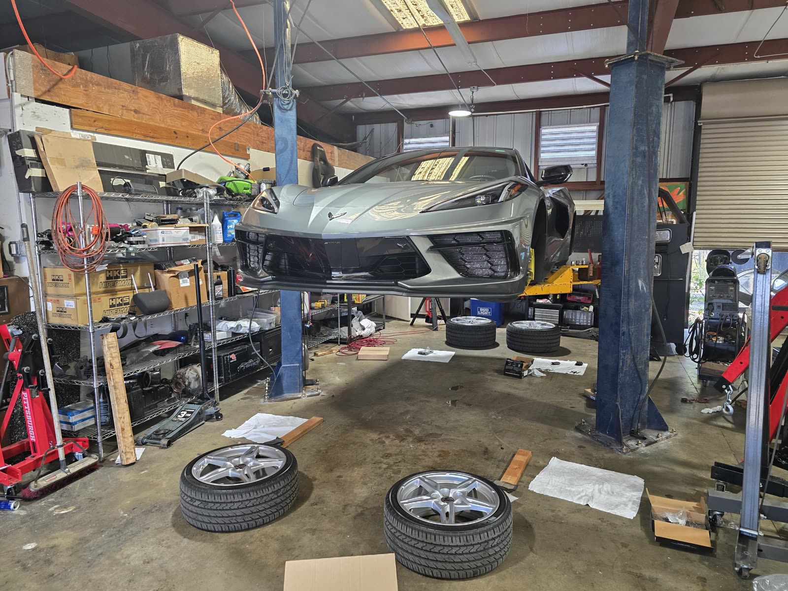 C8 Corvette on the lift, wheels off