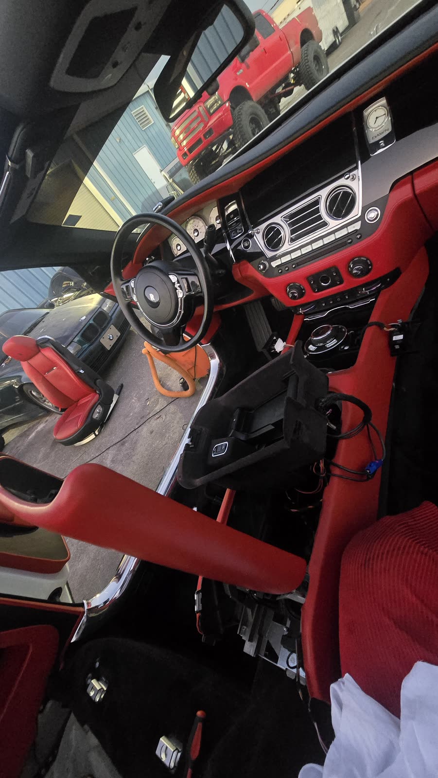 Rolls-Royce dash and red leather interior work