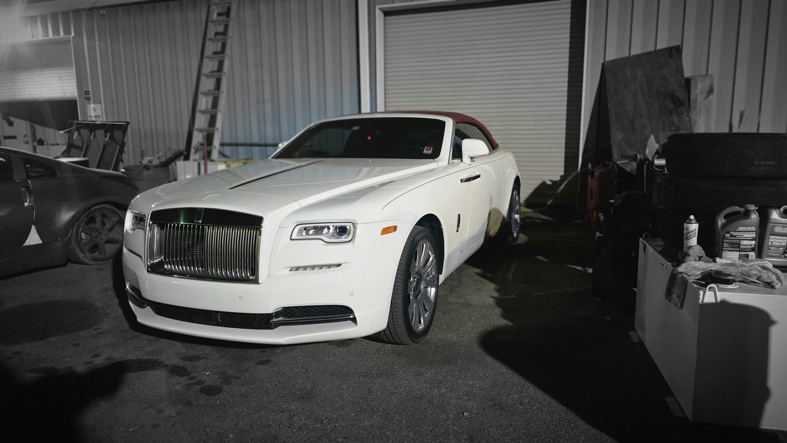 Rolls-Royce Wraith at the shop at night