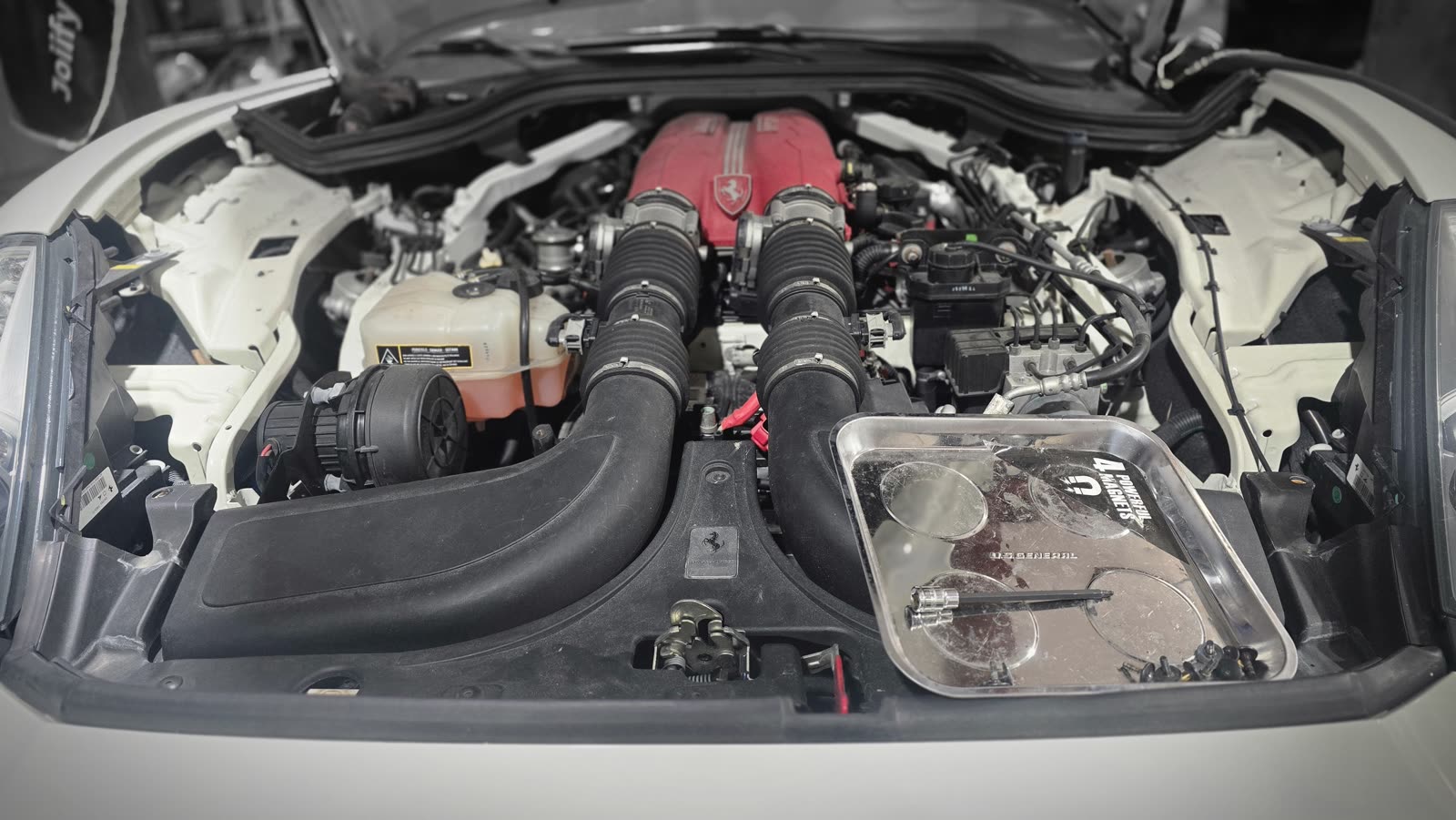 Ferrari engine bay with the intake exposed