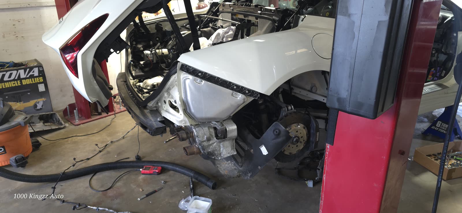 Ferrari front-end disassembly on the lift