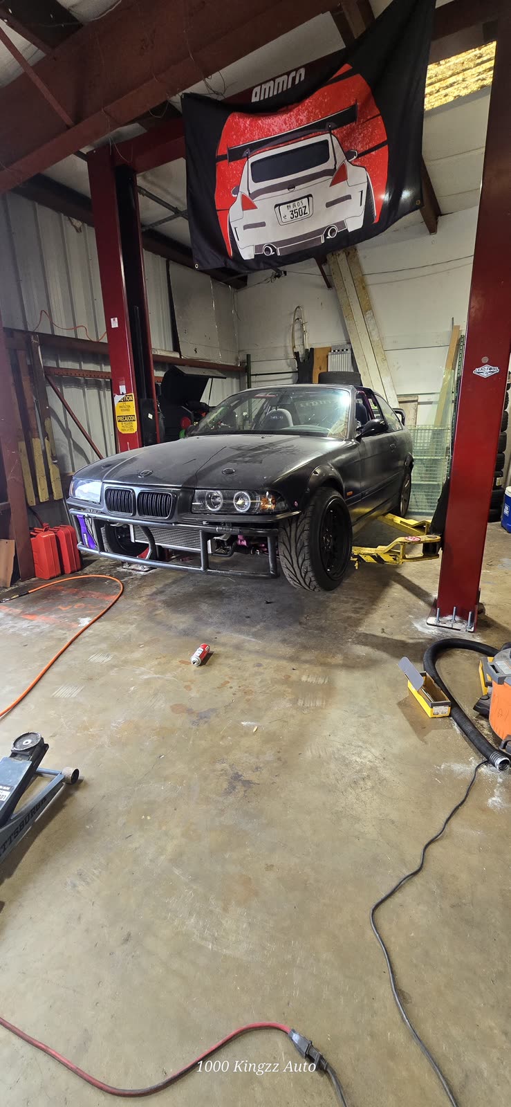 Project car up on the two-post lift