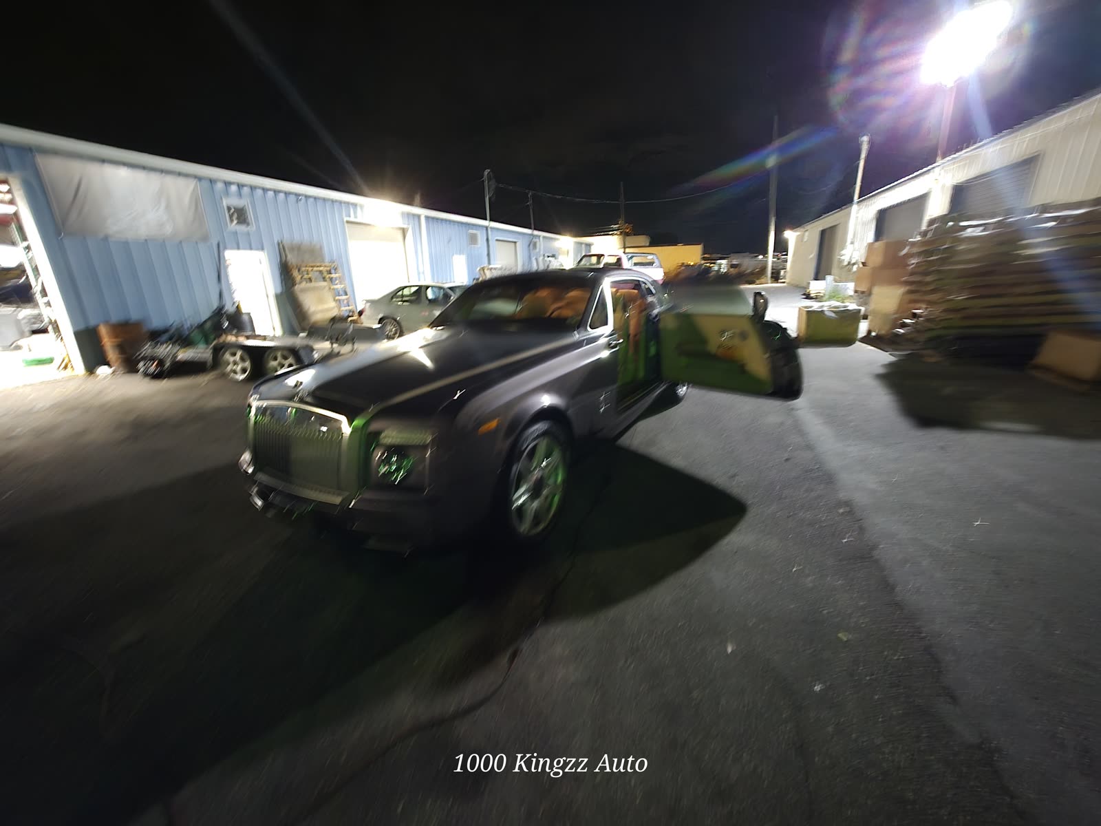 Two-tone Rolls-Royce outside the shop